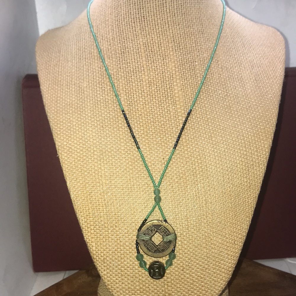 Green seed bead necklace w/ coin style pendant